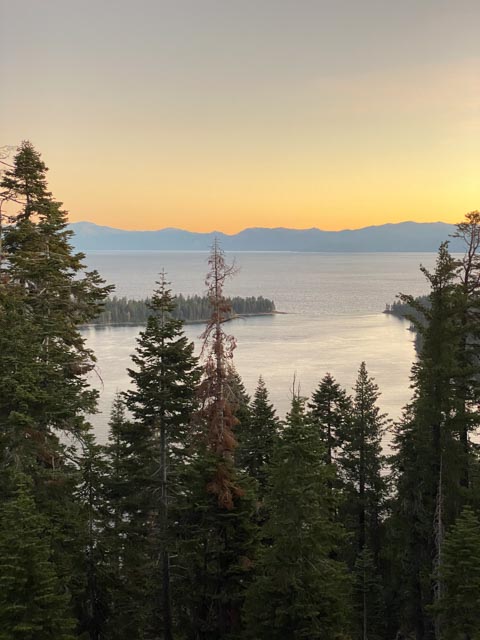 Lake Tahoe fall sunset through the trees. Photography by California Travel Escapes